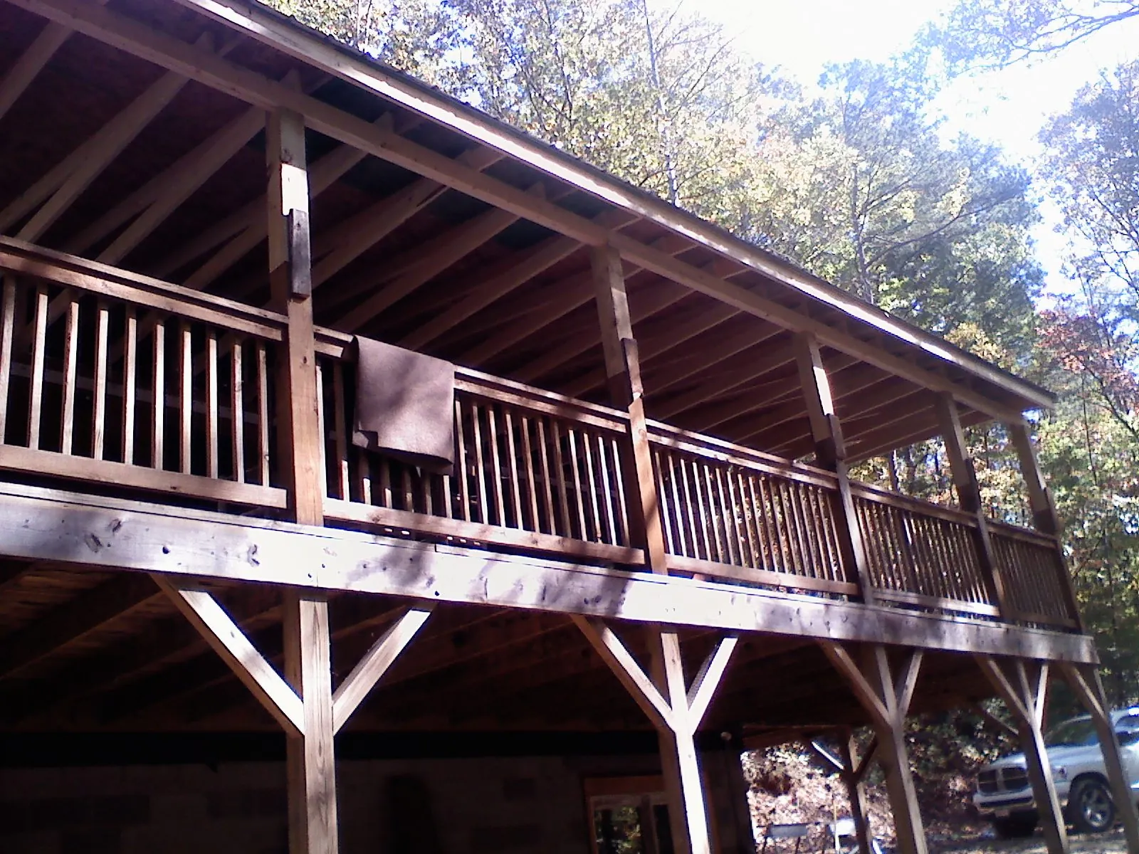 Timber framing under a new elevated porch and deck — Roof Leak Repair in Lucedale by Roofing Brothers